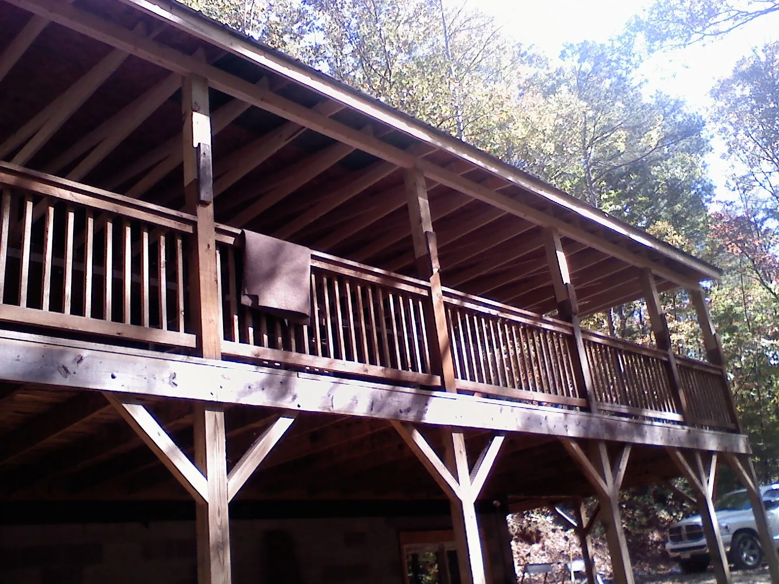 Timber framing under a new elevated porch and deck — Roof Leak Repair in Lima by Roofing Brothers